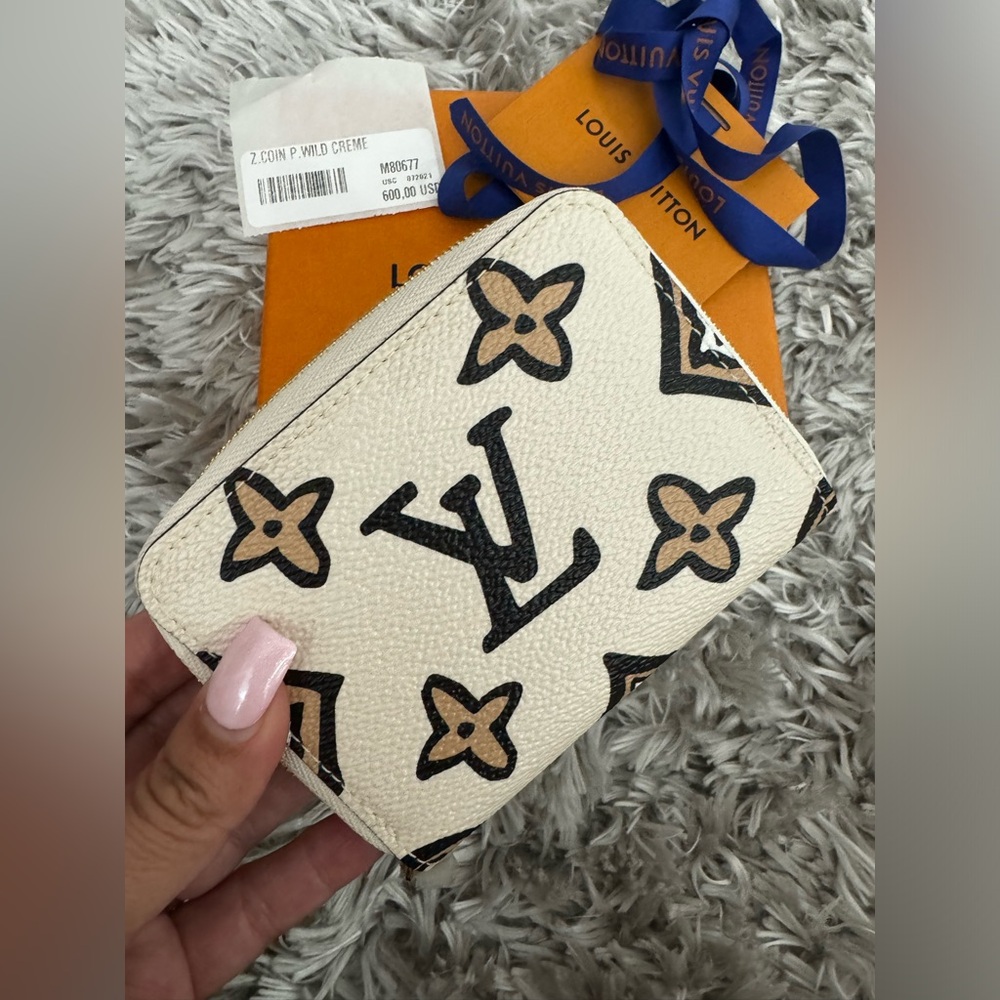 Louis Vuitton coin P. Wild cream wallet